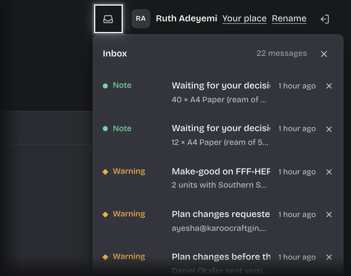 The inbox button at the top right outlined, with the Inbox preview open below it
